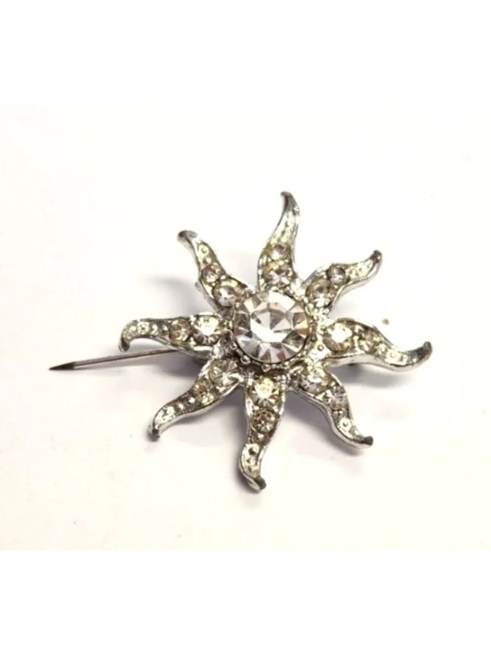 Rhinestone Sunburst Brooch With Silver-Tone Metal